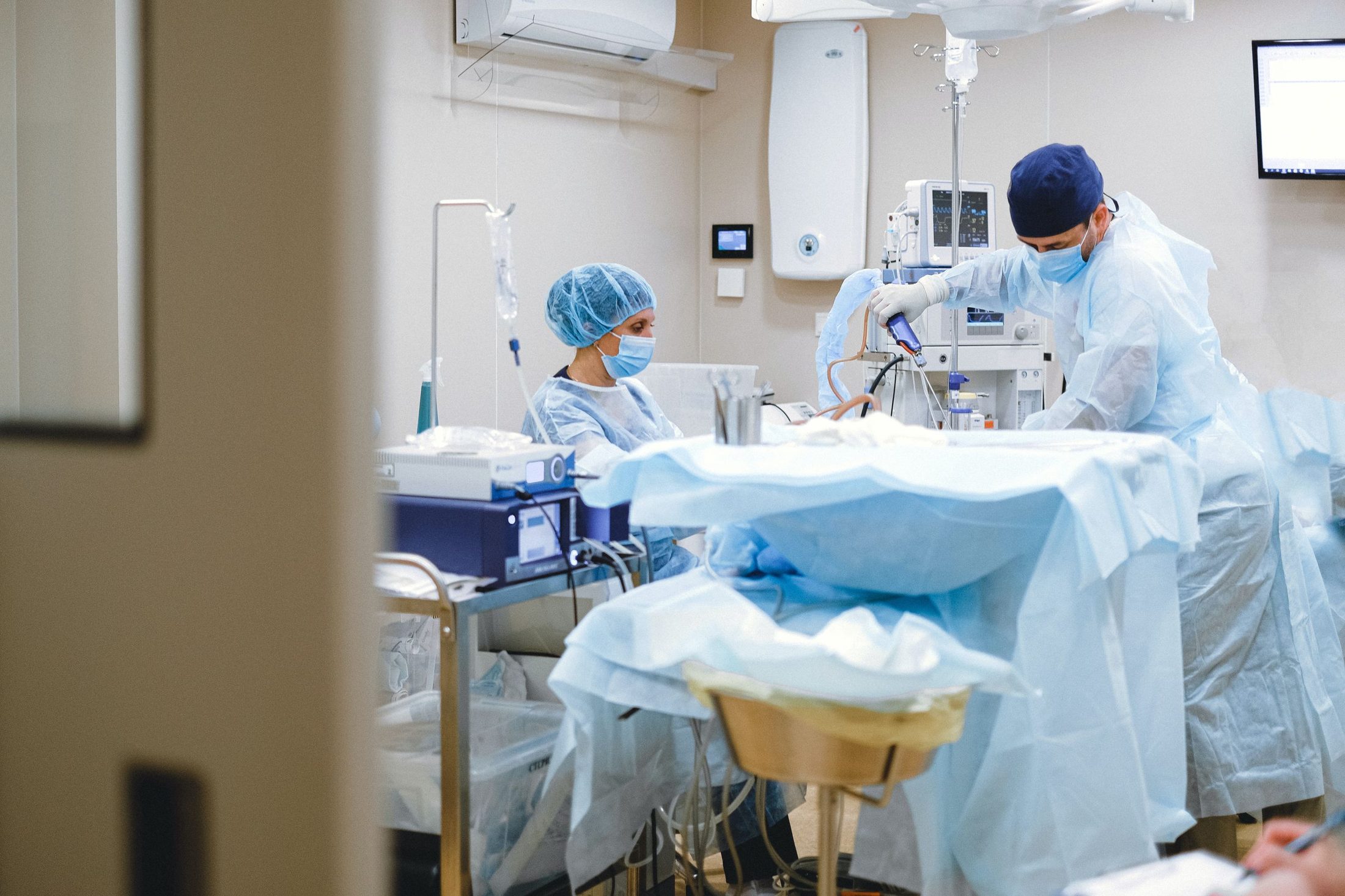 A surgical team at work in a hospital operating room