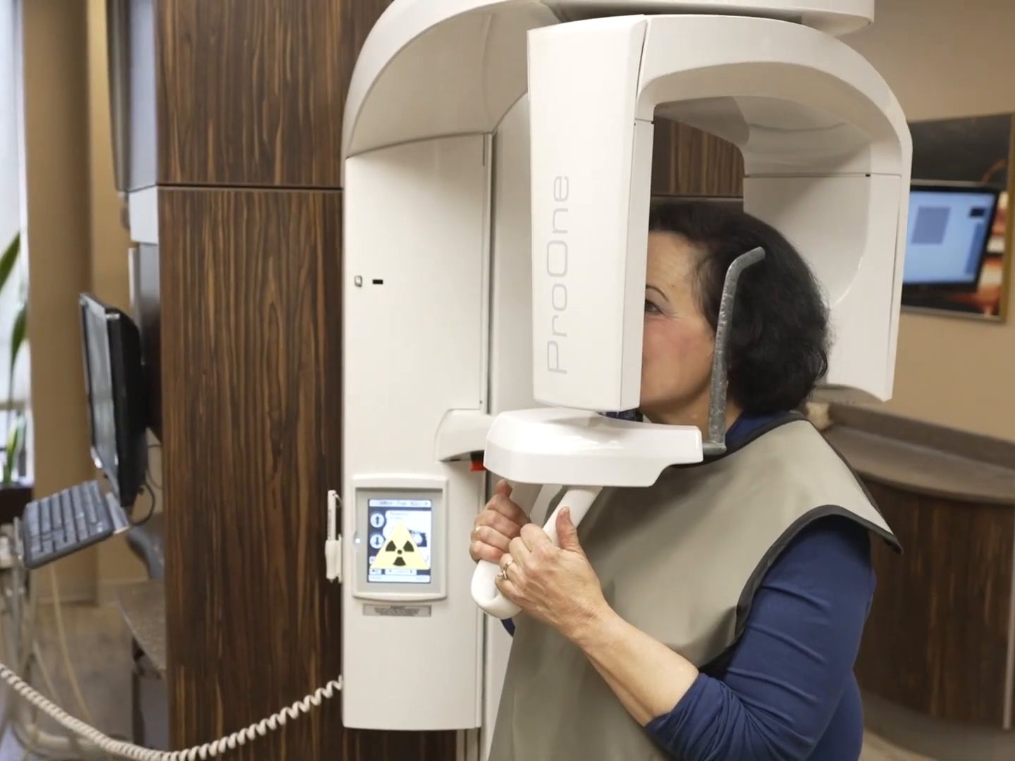 A patient positioned in the 3D X-ray scanner at West LA Implants