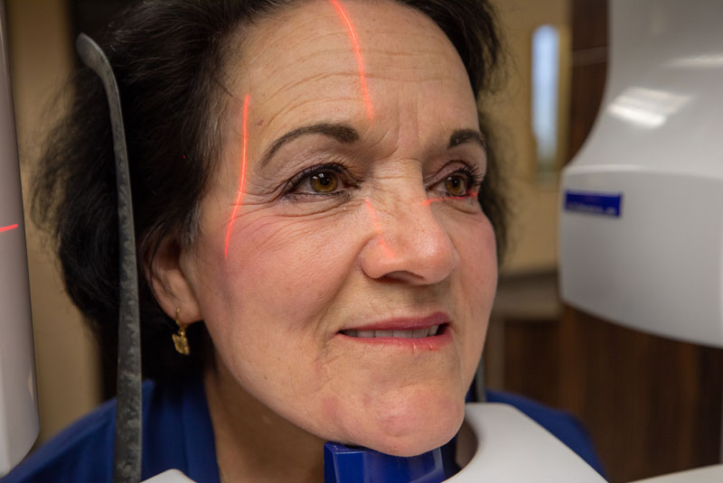 A patient positioned for a 3D cone-beam scan